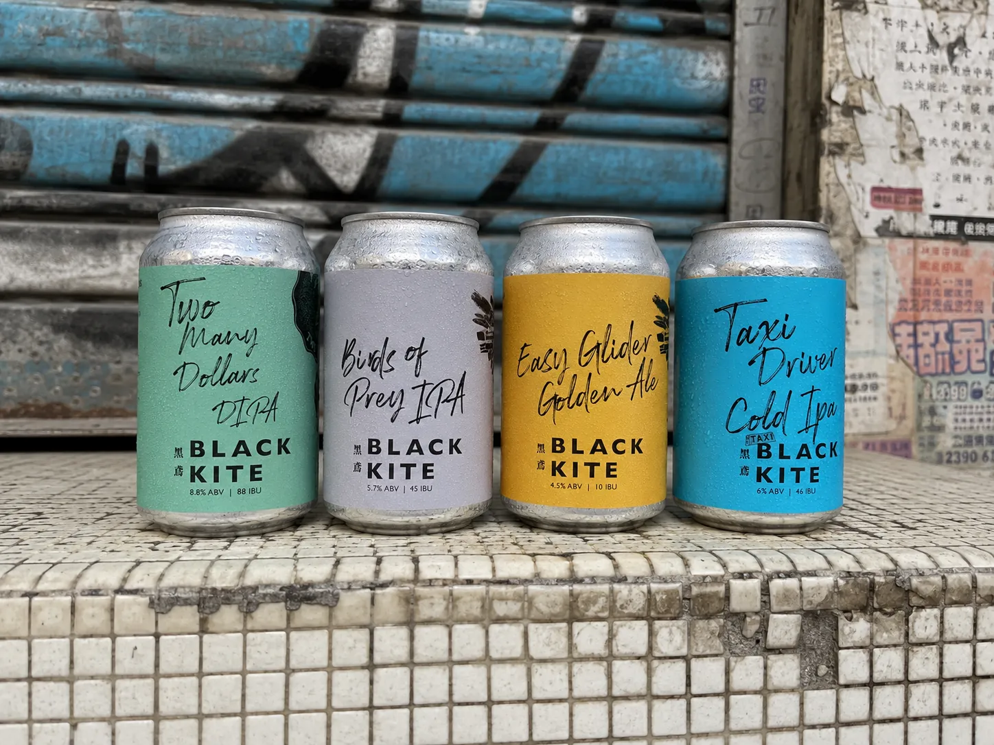 Black Kite craft beer can series shown as a complete city packaging system
