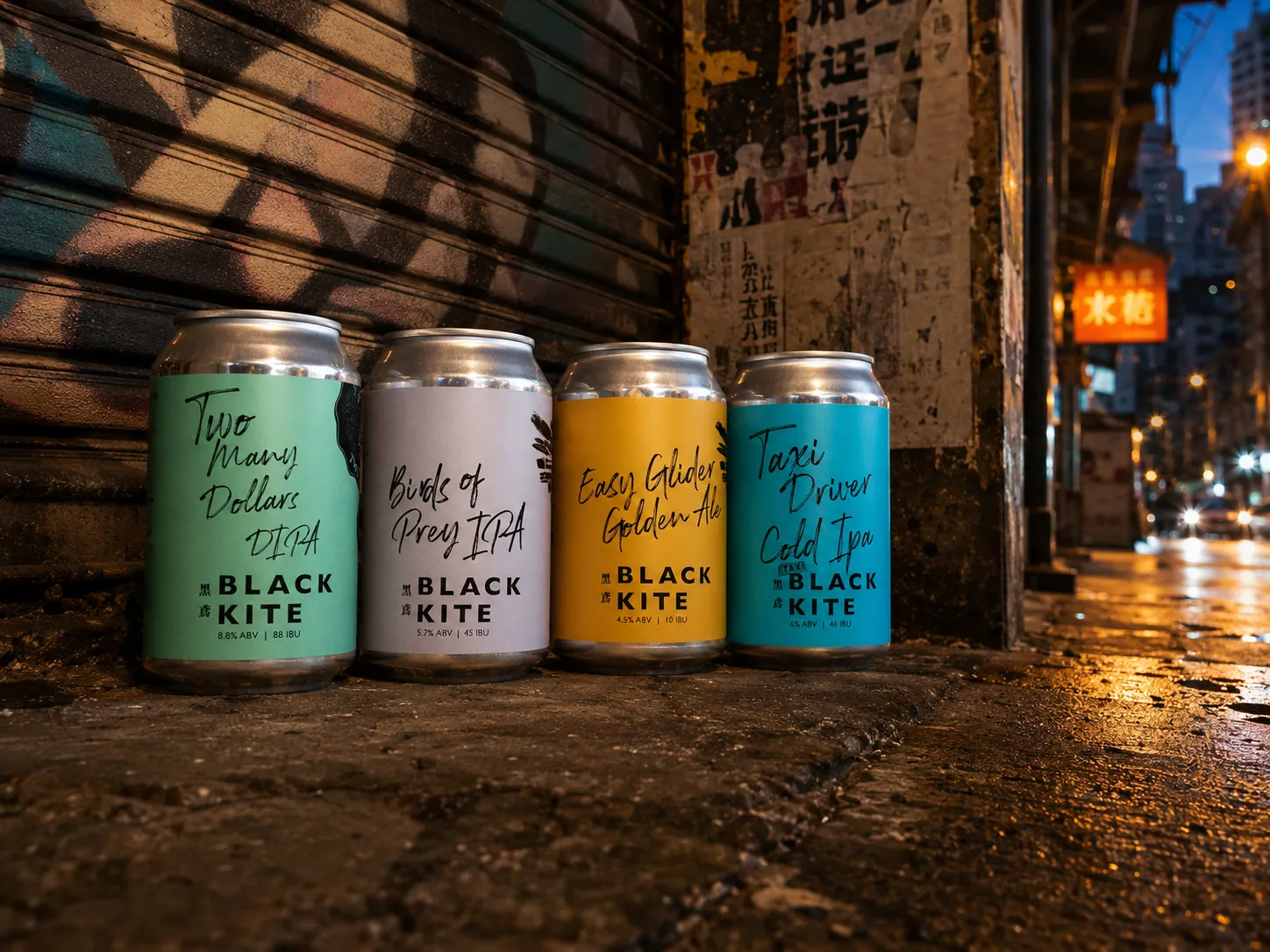 Black Kite four beer cans shown as a full series on a Hong Kong street at night