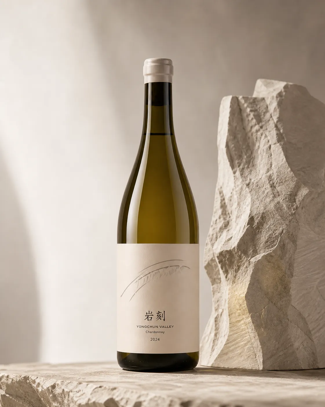Yanker bottle photographed in a pale studio beside a carved stone surface