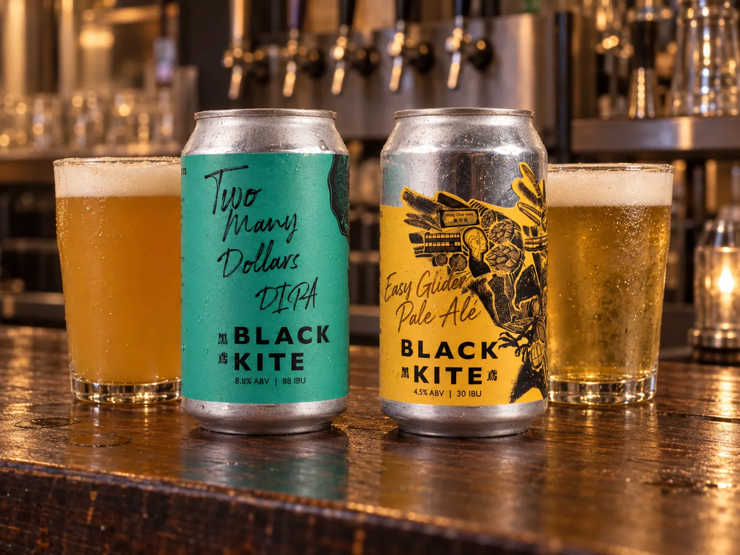 Complete Black Kite Two Many Dollars and Easy Glider cans served with beer glasses on a real bar counter