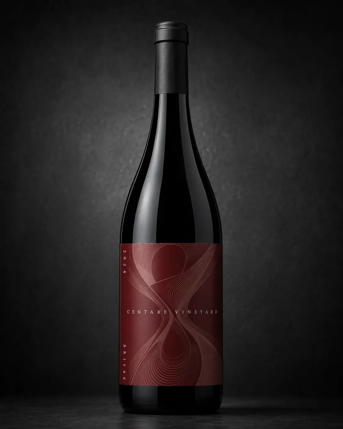 CENTARE Shiraz bottle on a dark background showing the deep red linear label